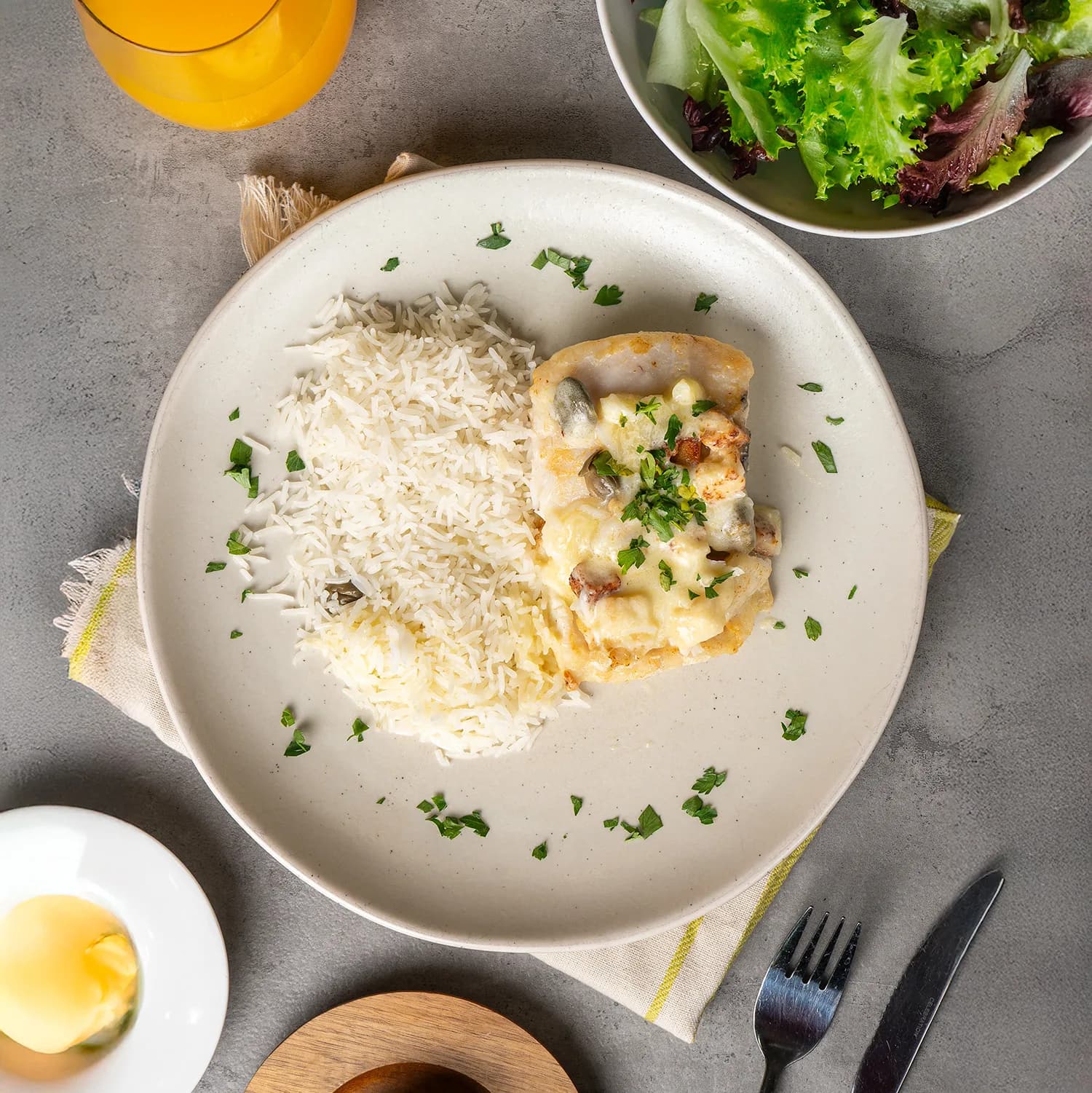 Merluza austral grenobloise con arroz basmati